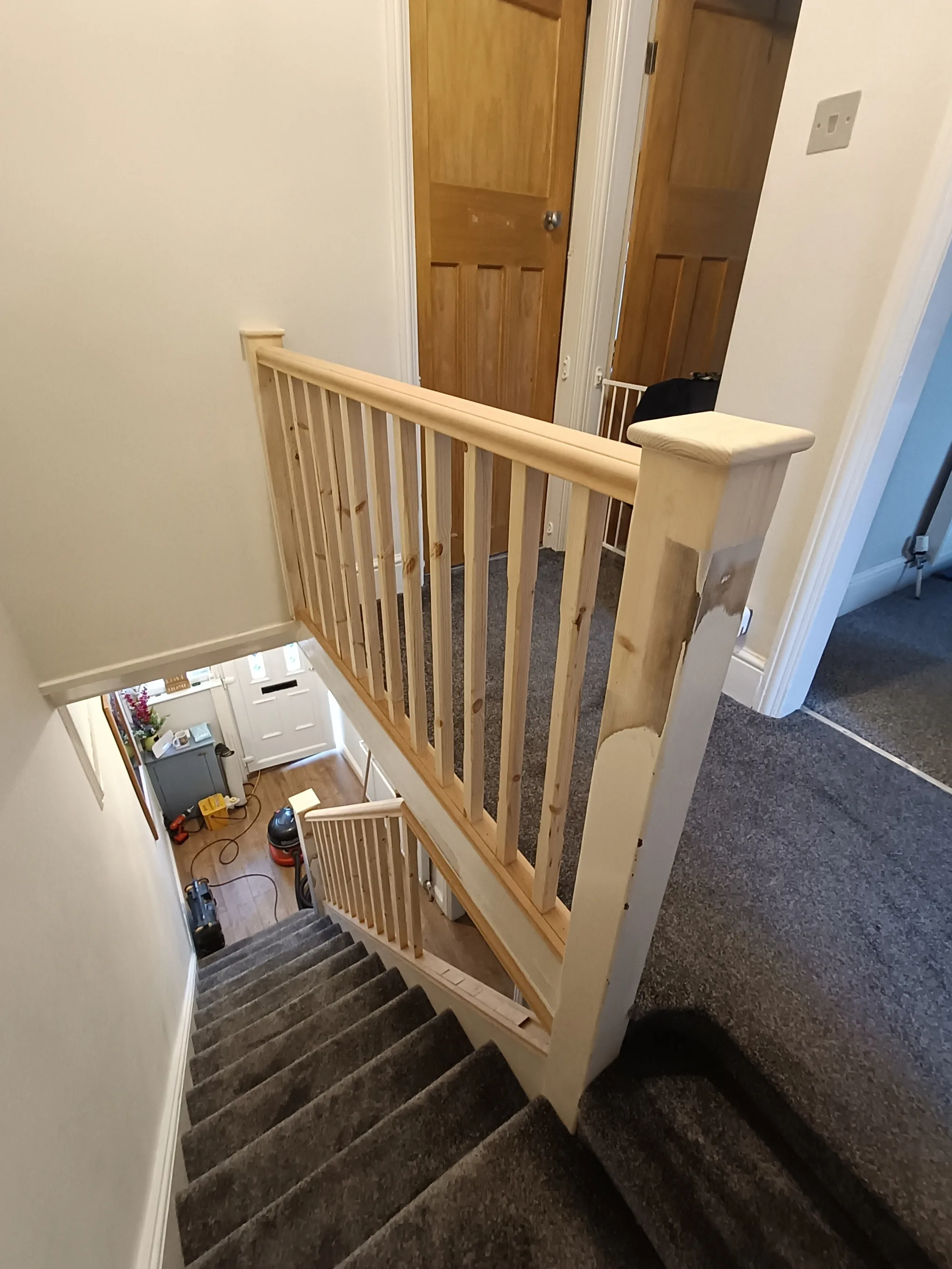 New landing balustrade looking down the stairs
