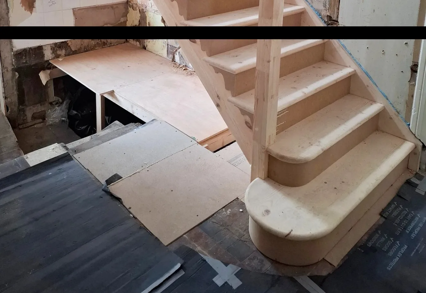 Bottom steps of the new staircase