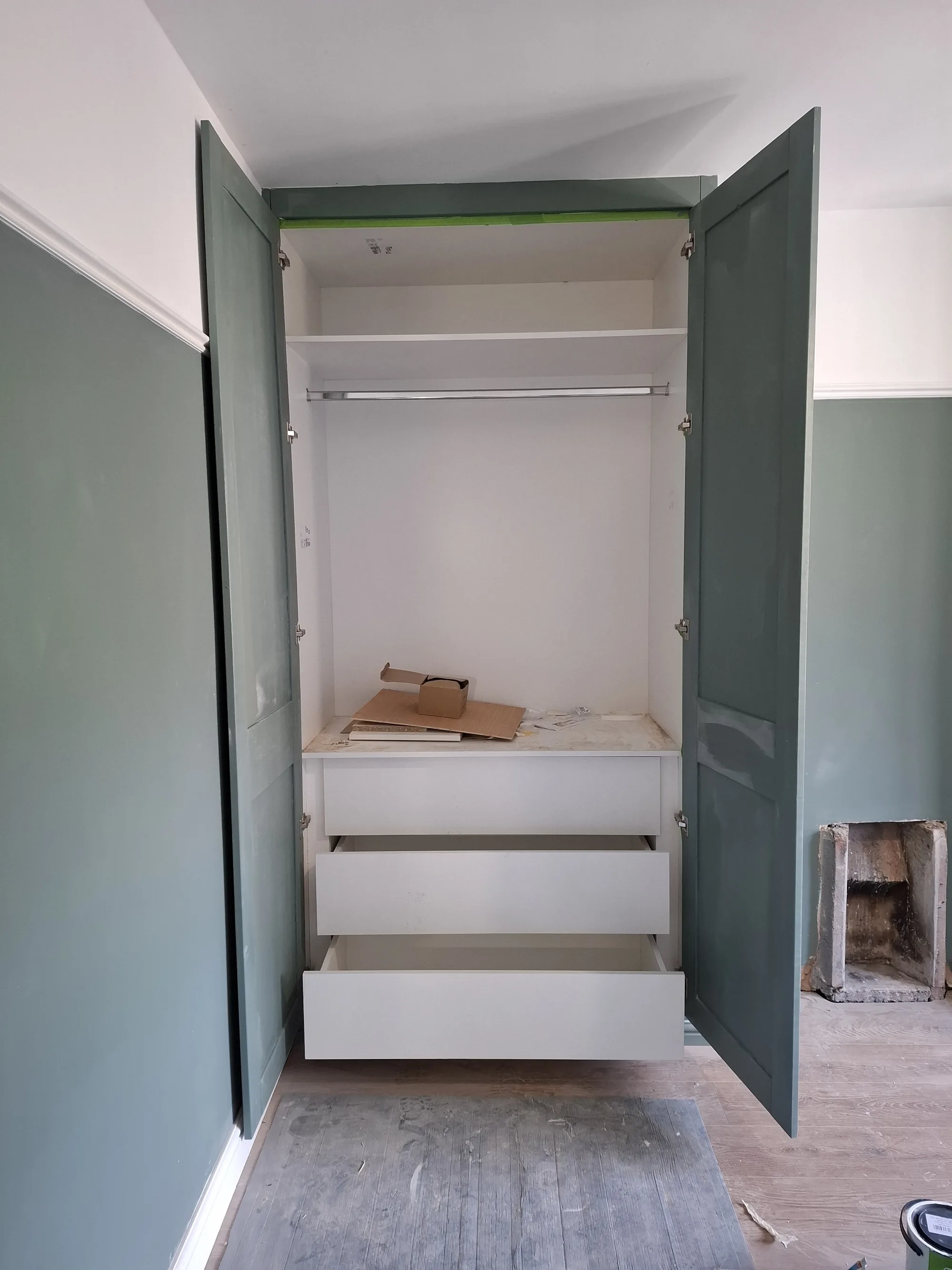 Inside the wardrobe with a drawer pulled out